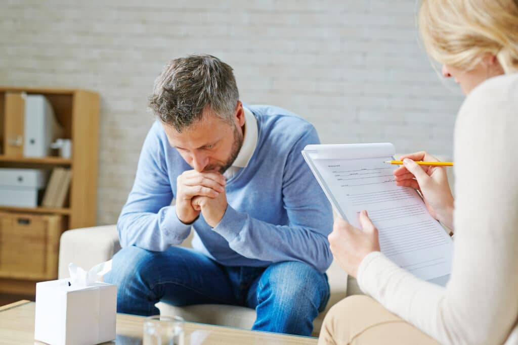 man stressed with seasonal mental health