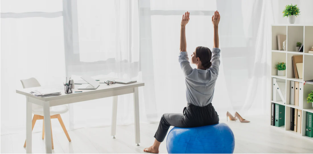 women doing office desk workout