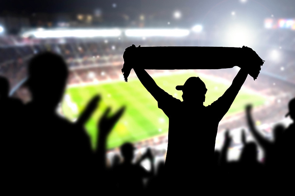 This image shows the sports fans chanting.
