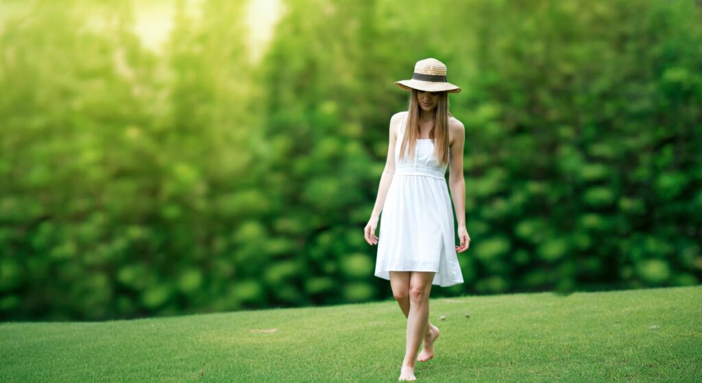 Woman walking barefoot outdoors